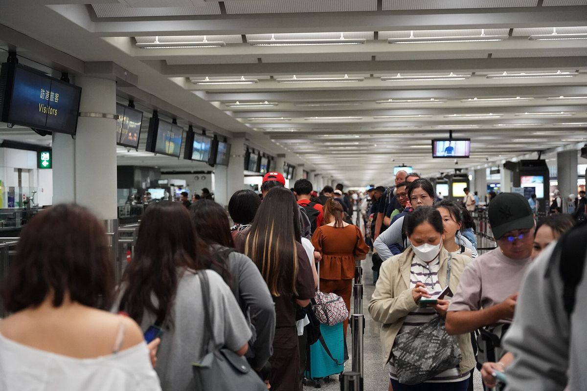 The visitors' immigration queue at Hong Kong airport